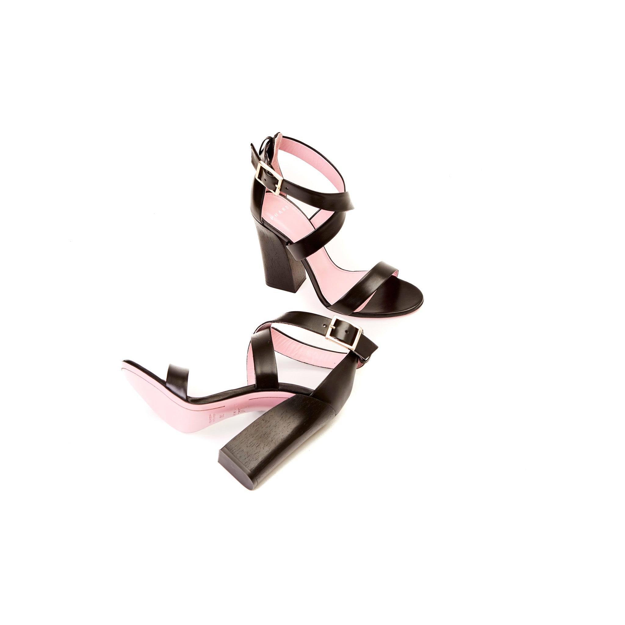 Phare Cross strap block heel sandal with wooden heel in black leather sole view