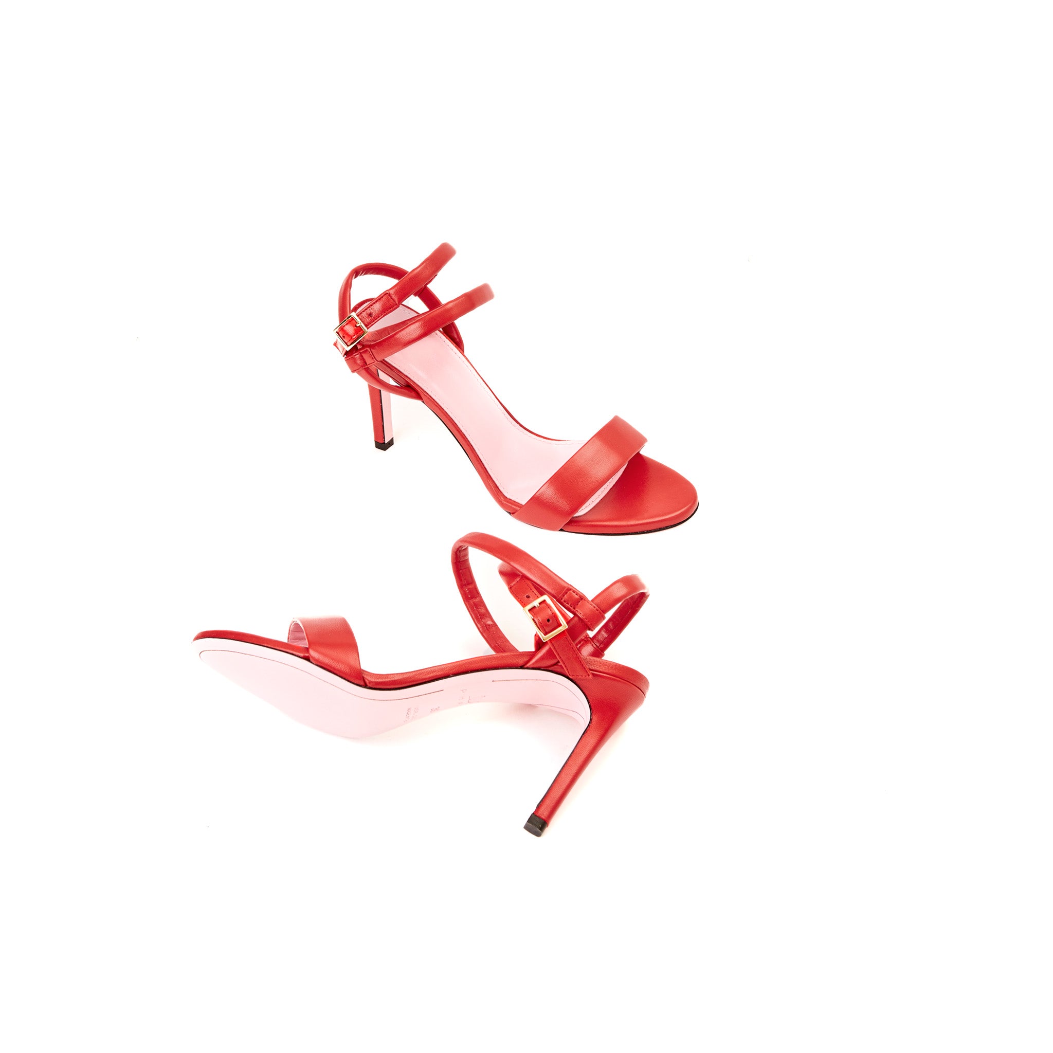 Phare Wrap ankle strap high heel sandal in red leather sole view